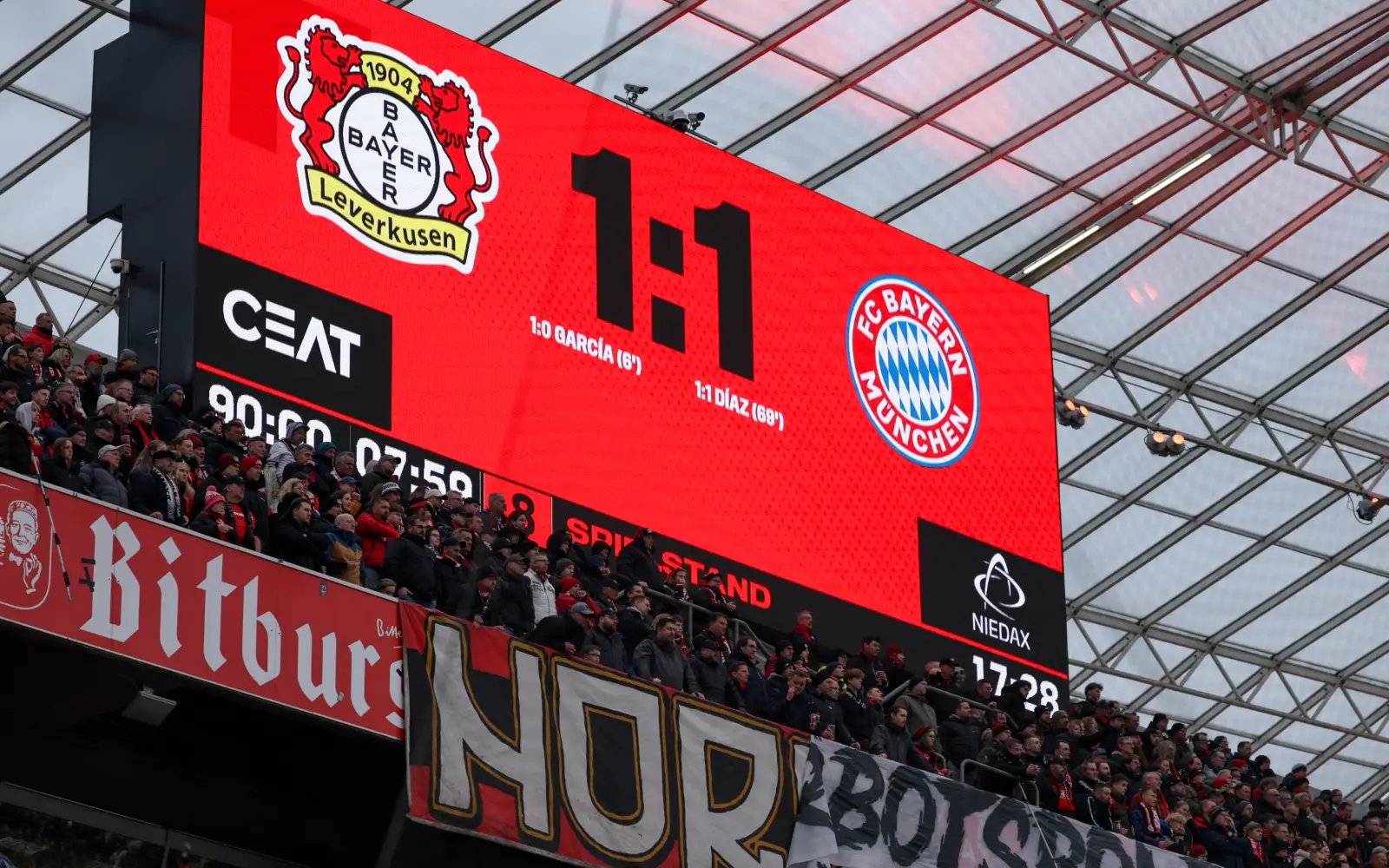 Nine-man Bayern fight to draw at Leverkusen
