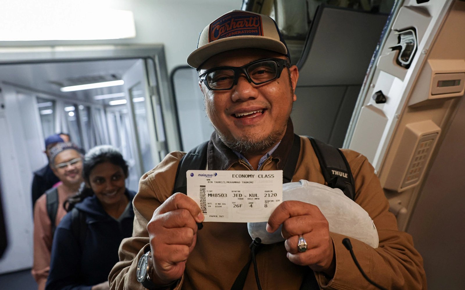 163 Malaysians arrive home on first evacuation flight from West Asia