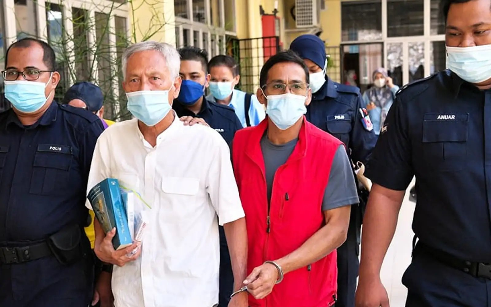 Ex-diplomat, son freed of drug charges