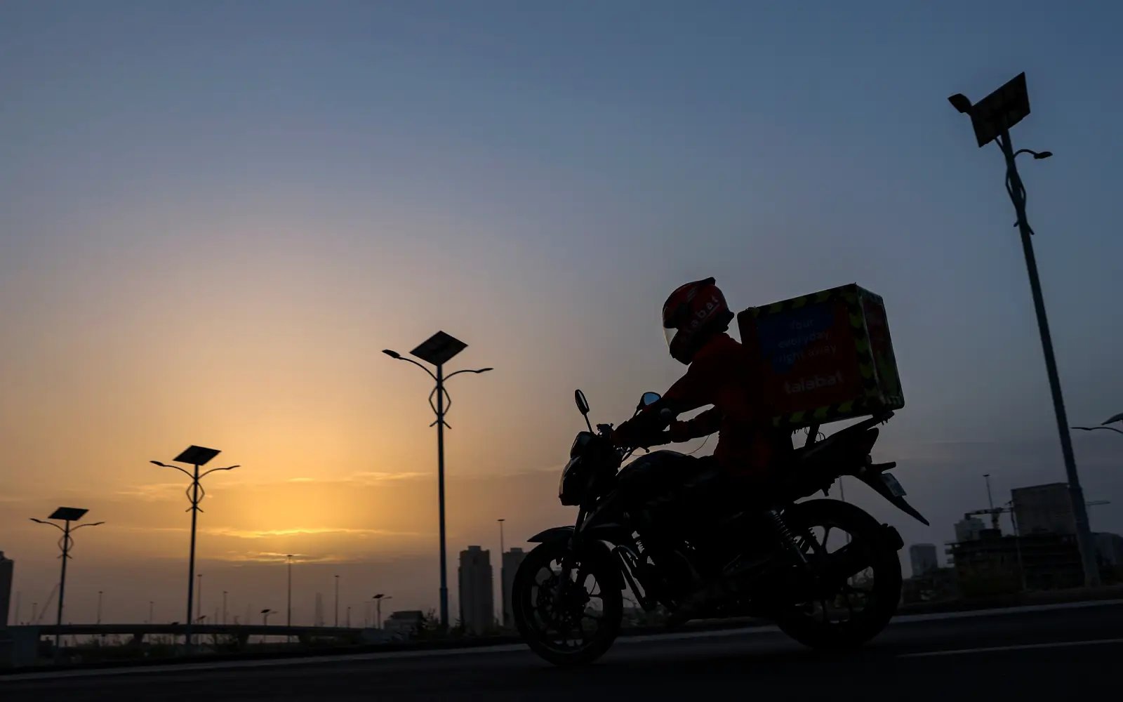 Delivery drivers dodge debris to keep Gulf fed under Iranian attacks