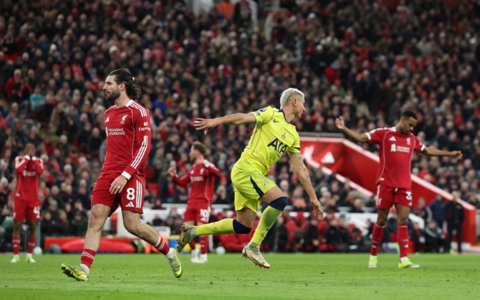 Troubled Spurs snatch late draw at Liverpool, Man Utd boost top-four bid