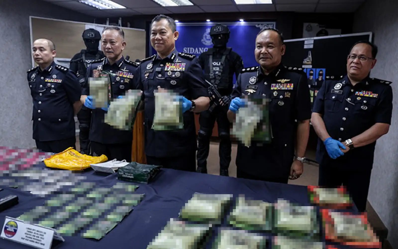 Johor cops cripple syndicate, seize RM1.8mil in drugs