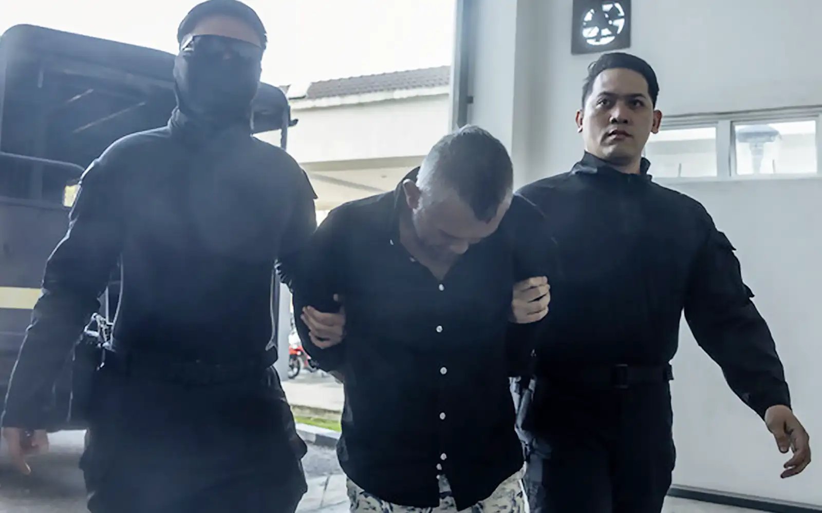 Suspended police corporal claims trial to robbery