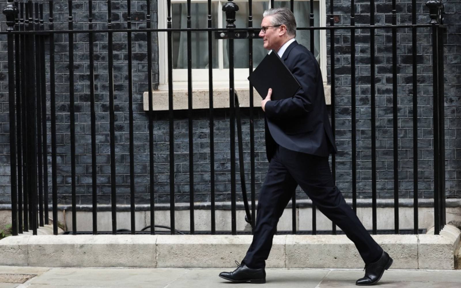 UK PM denies misleading MPs, says officials hid Mandelson info