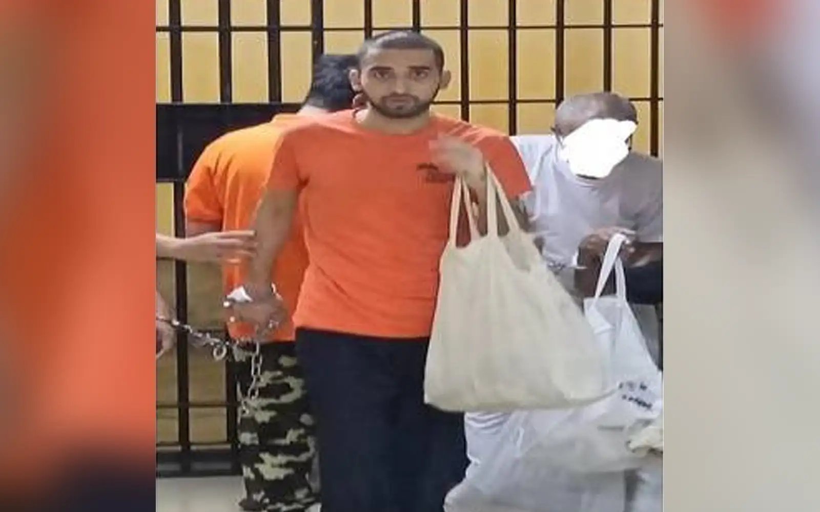 Pakistani detainee facing sexual, robbery charges at large