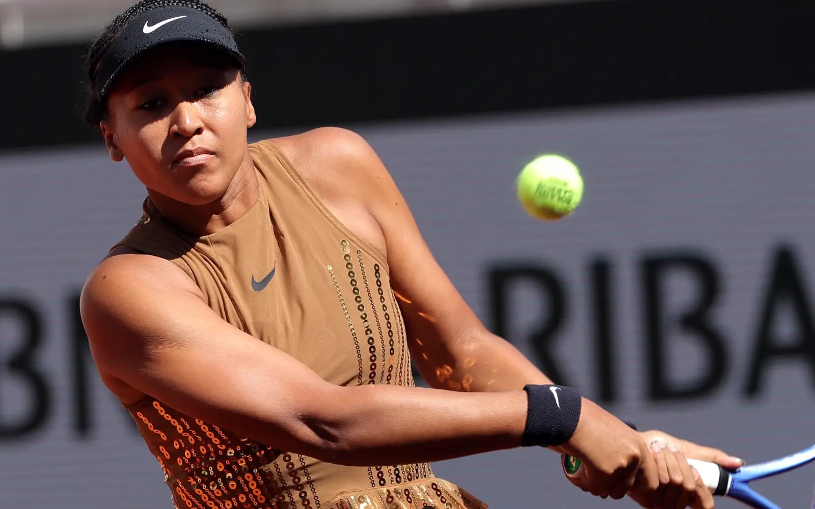 Glittering Osaka edges Jovic to prolong French Open run