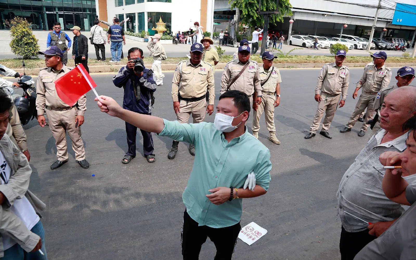 Cambodian PM’s cousin says owned 30% of scam-linked firm