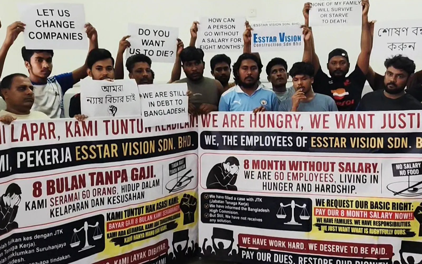 JB firm says pay dispute being resolved, workers claim otherwise
