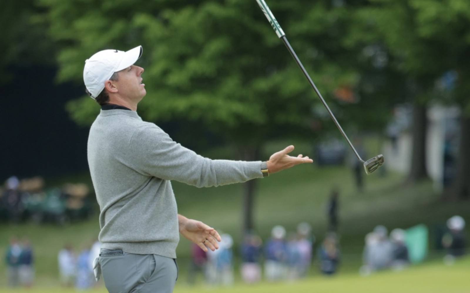 Frustrated McIlroy drops F-bomb in exchange with PGA heckler