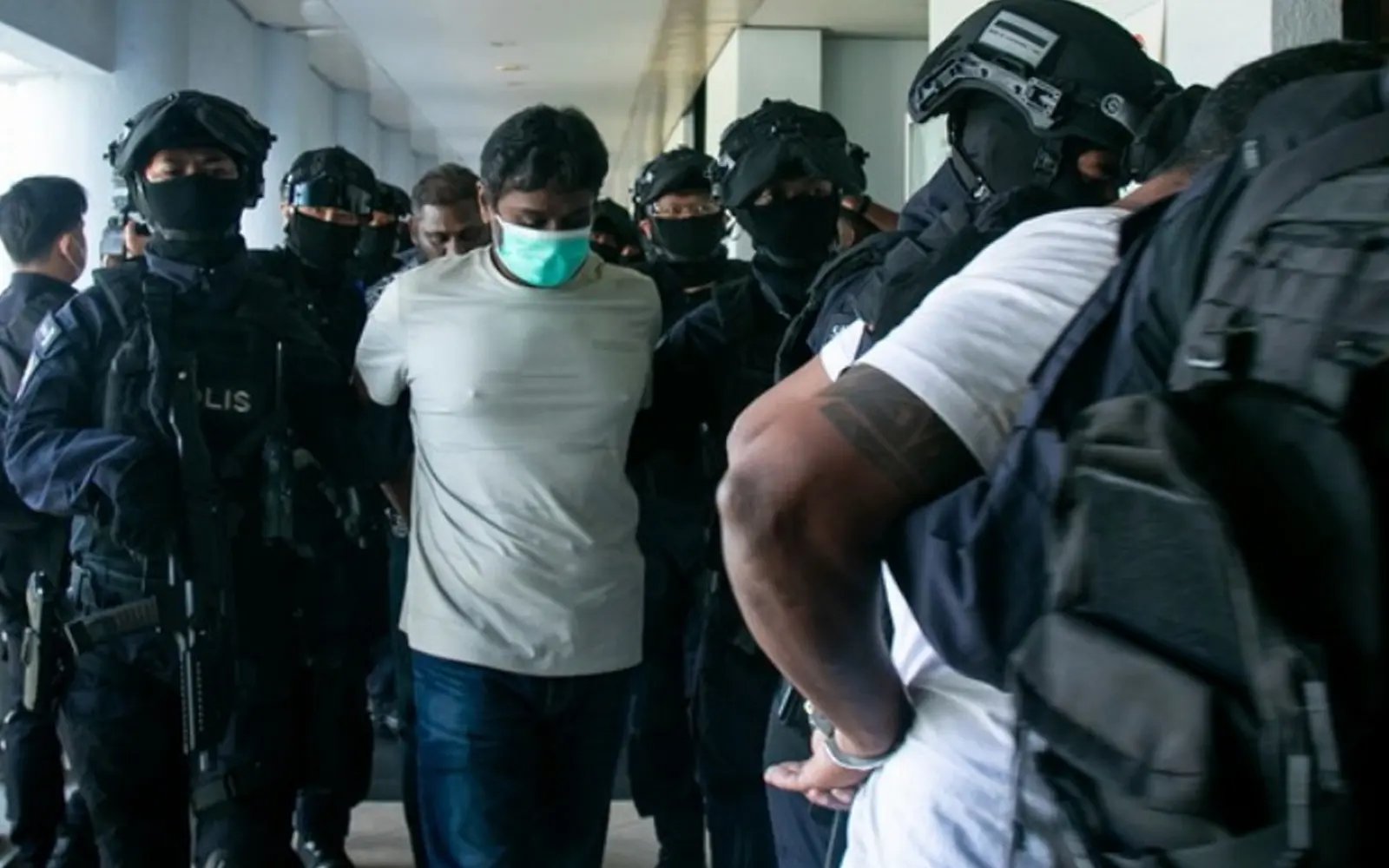 11 charged with being members of organised crime group