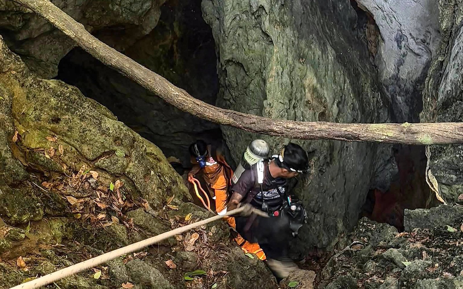 Rescue divers find 5 of 7 people trapped in Laos cave alive
