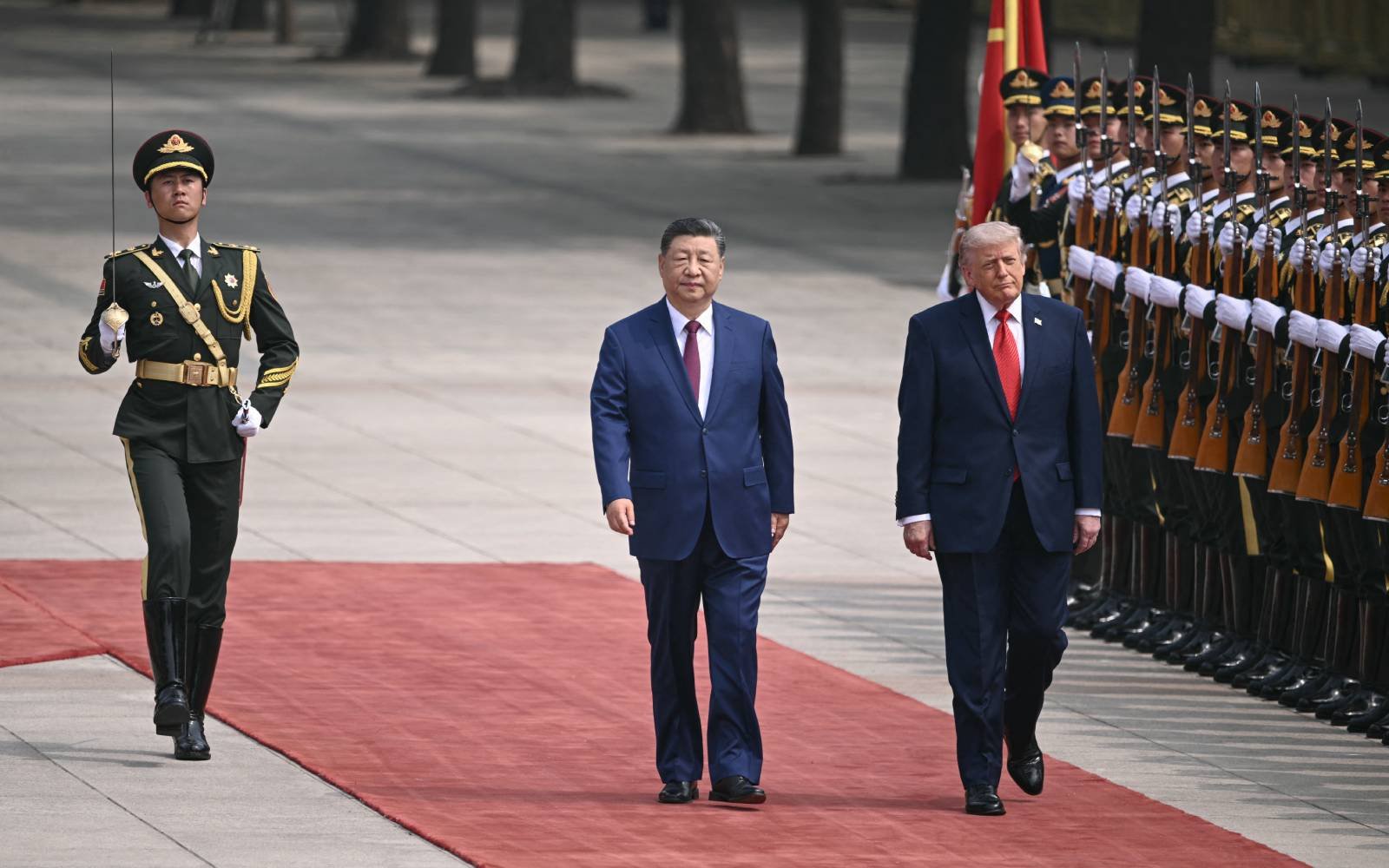 Trump and Xi meet for high-stakes talks in Beijing