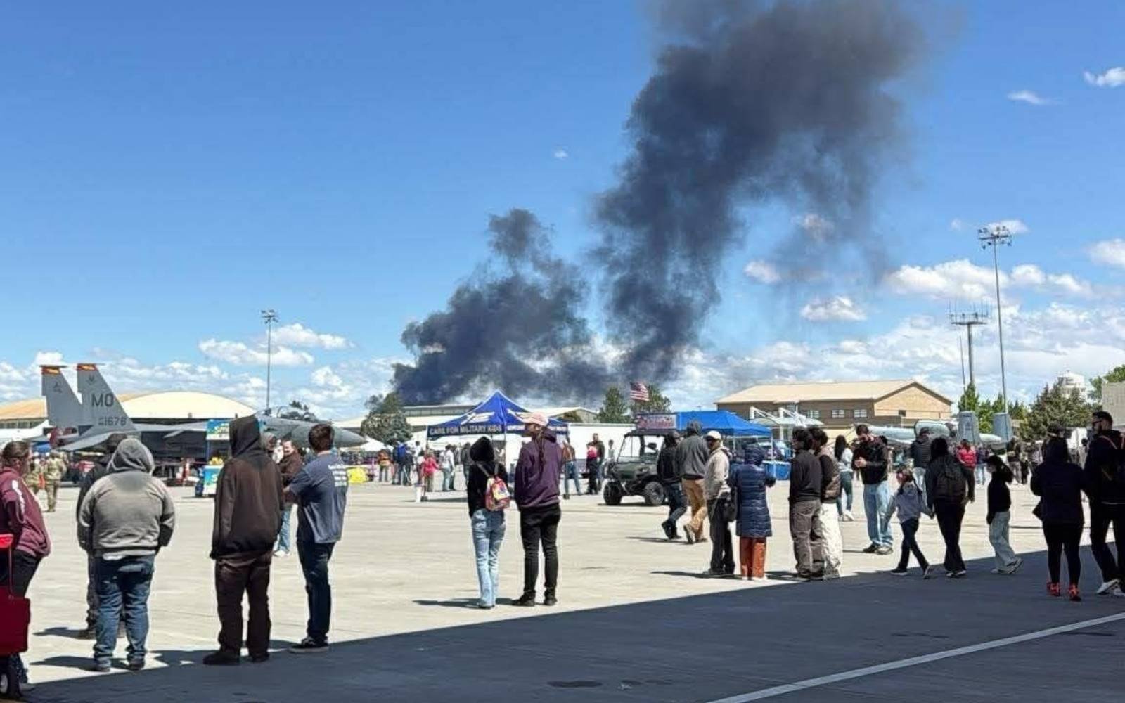 Aircraft collision over air show downs two US fighter jets