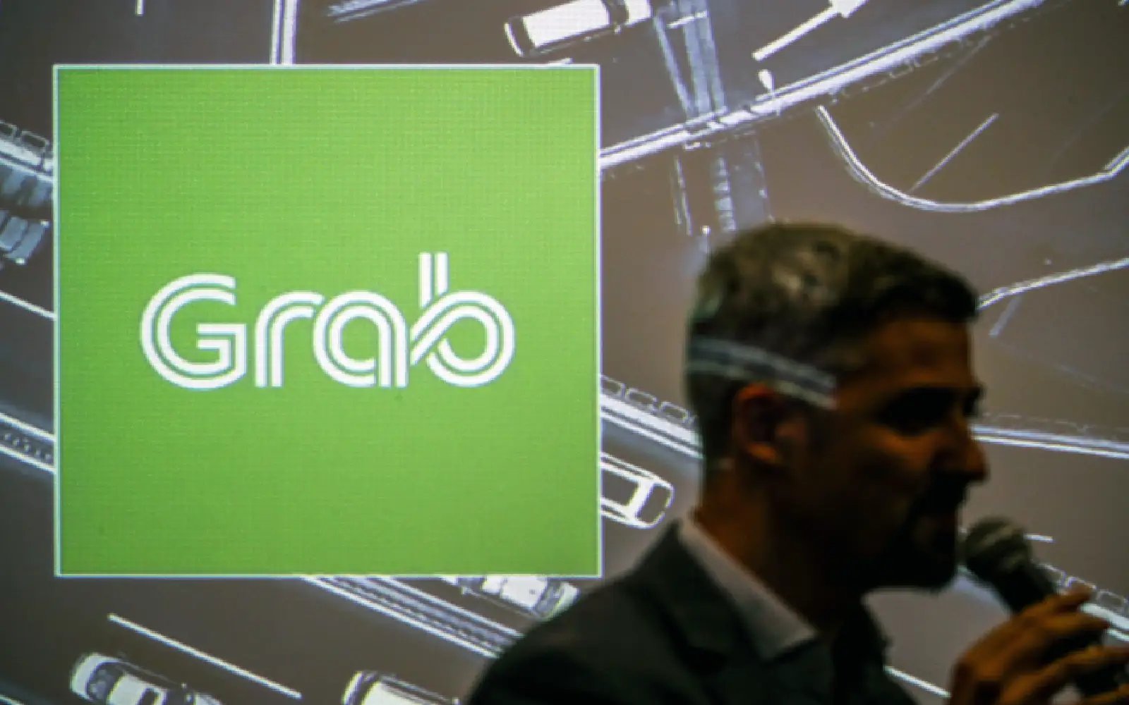 Grab earnings top estimates on resilient ride, delivery demand