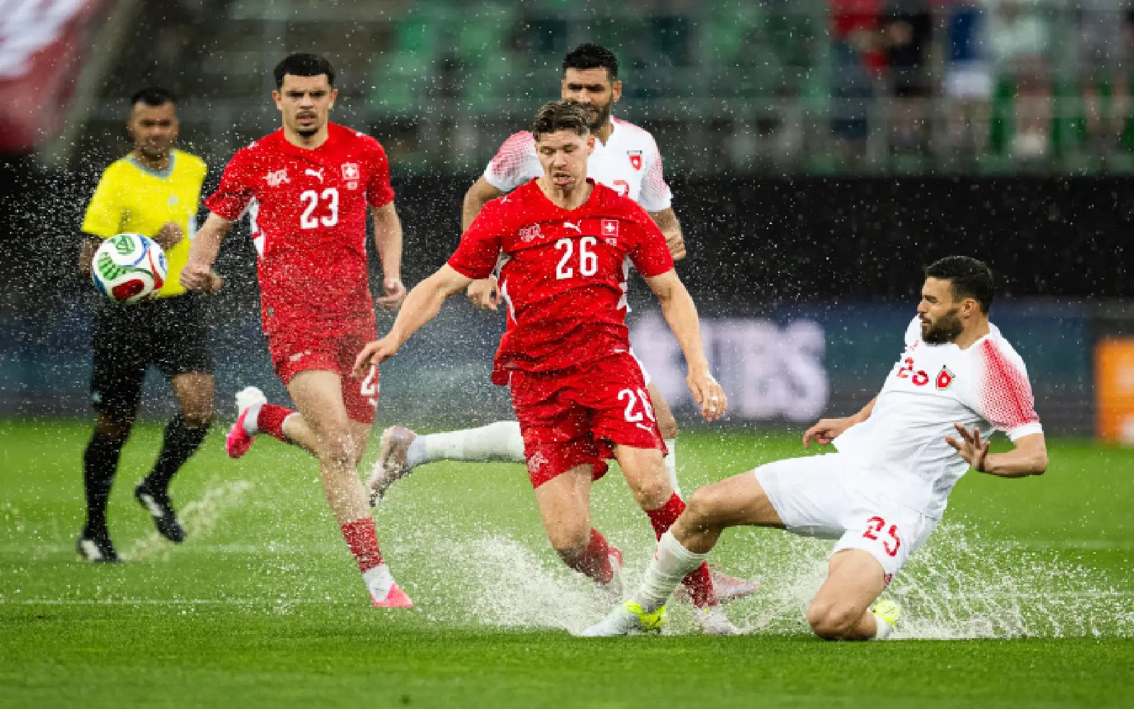 Swiss score four against Jordan in rainy World Cup send off