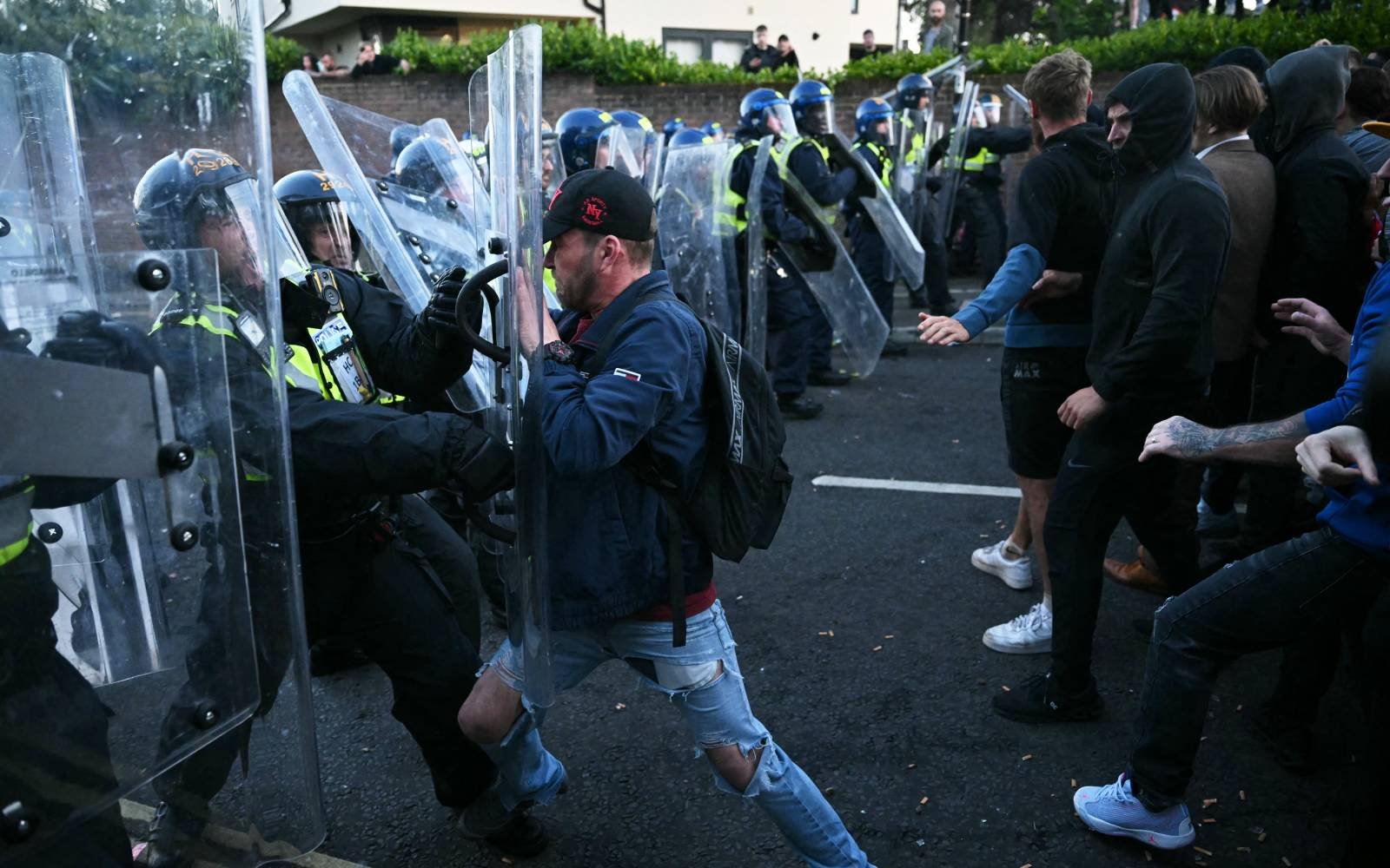‘I can’t breathe’: clashes erupt after UK police handcuff dying student