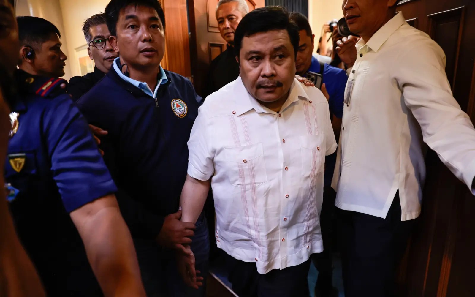 Philippine senator Estrada surrenders after arrest order in plunder case