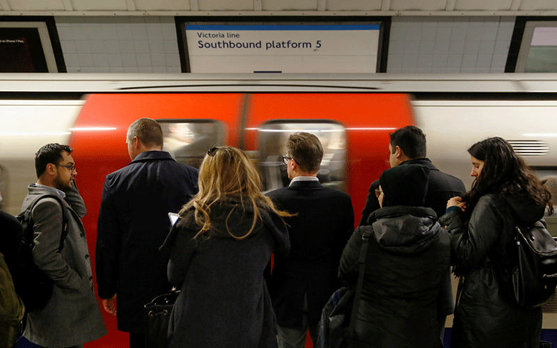 UK jobs rise again after furlough scheme, easing BoE worries